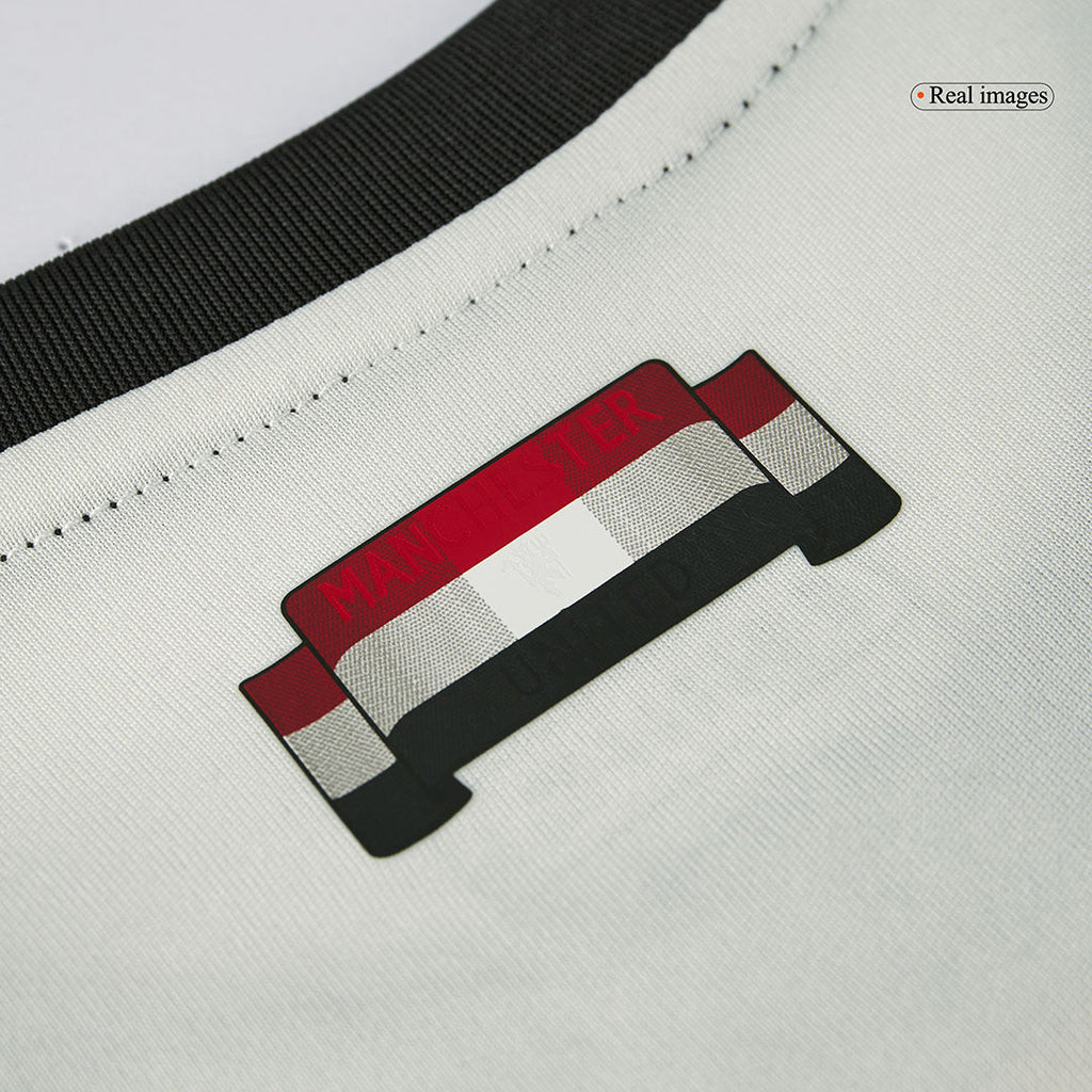 Camiseta de fútbol infantil de visitante del Manchester United (camiseta y pantalón corto) 2024/25