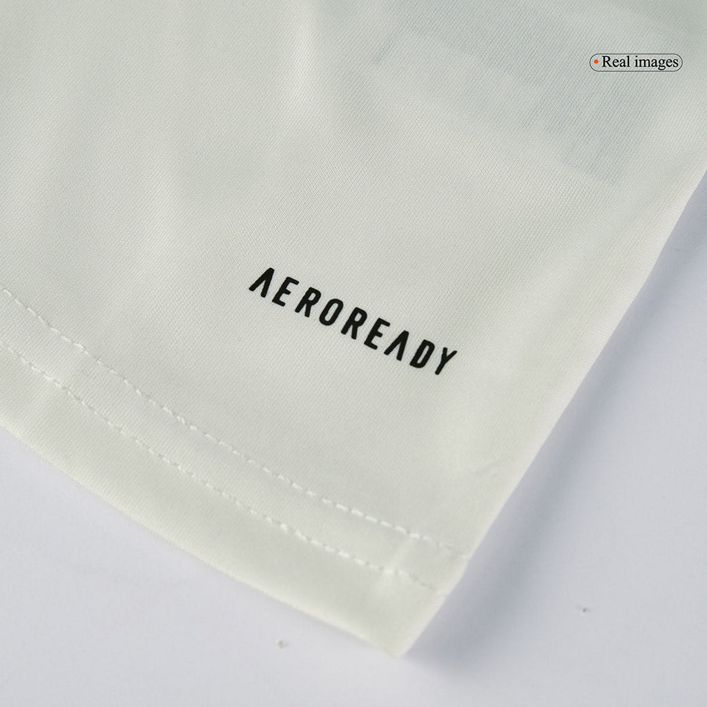 Camiseta de fútbol infantil de visitante del Manchester United (camiseta y pantalón corto) 2024/25