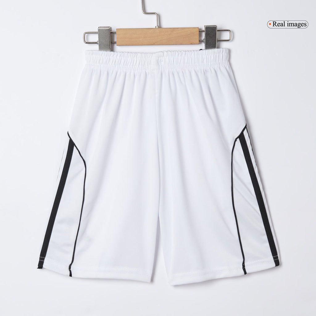 Kit de fútbol para niños: camiseta local del Manchester United (camiseta, pantalones cortos y calcetines) 2025/26