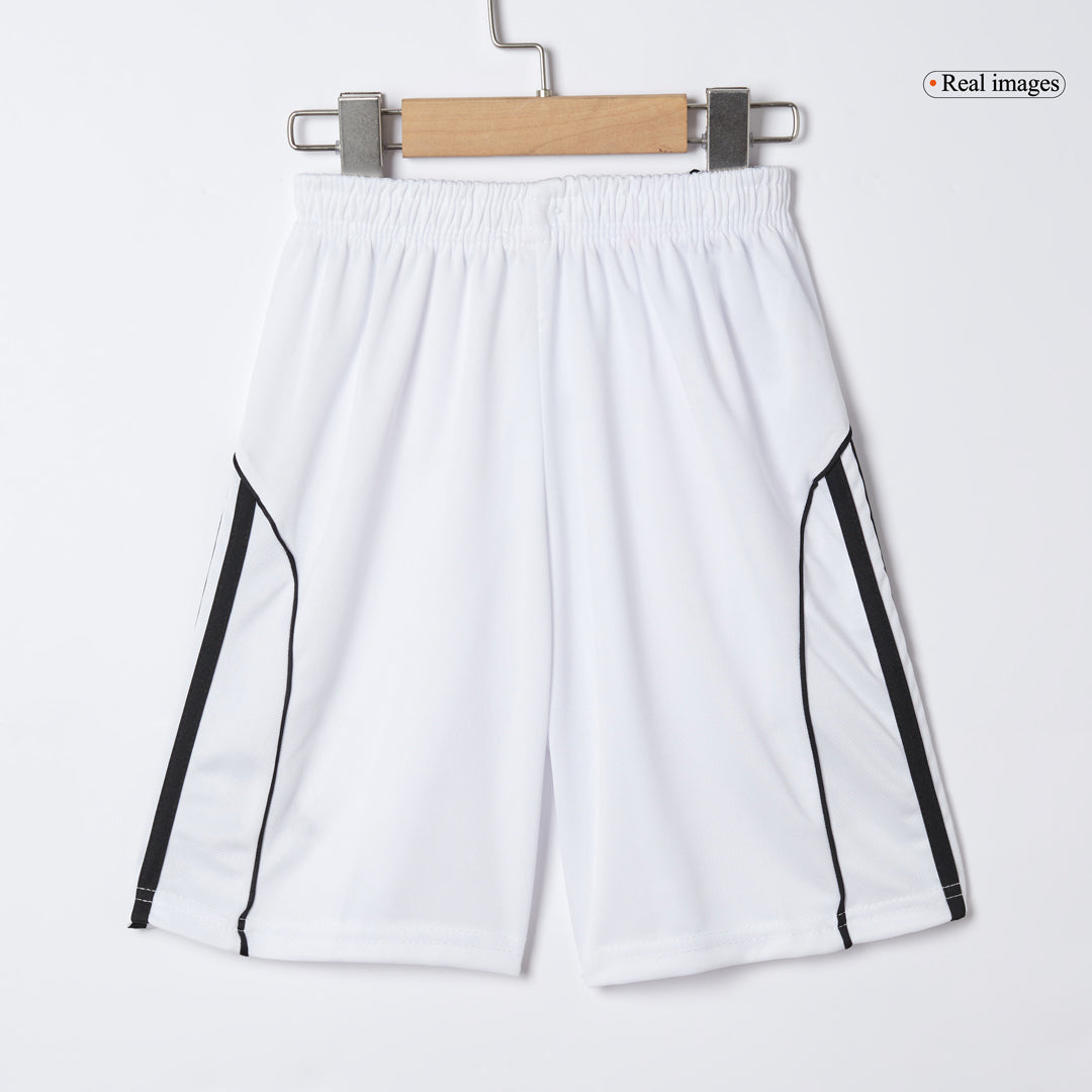 Kit de fútbol para niños: camiseta local del Manchester United (camiseta, pantalones cortos y calcetines) 2025/26