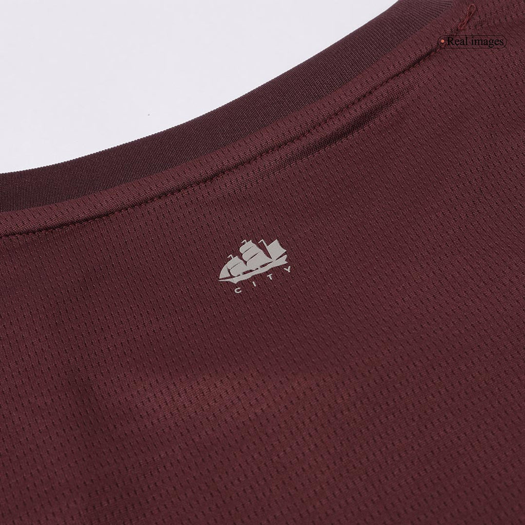 Camiseta de fútbol infantil de visitante del Manchester City (camiseta y pantalón corto) 2024/25