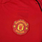 Kit de fútbol para niños: camiseta local del Manchester United (camiseta, pantalones cortos y calcetines) 2025/26