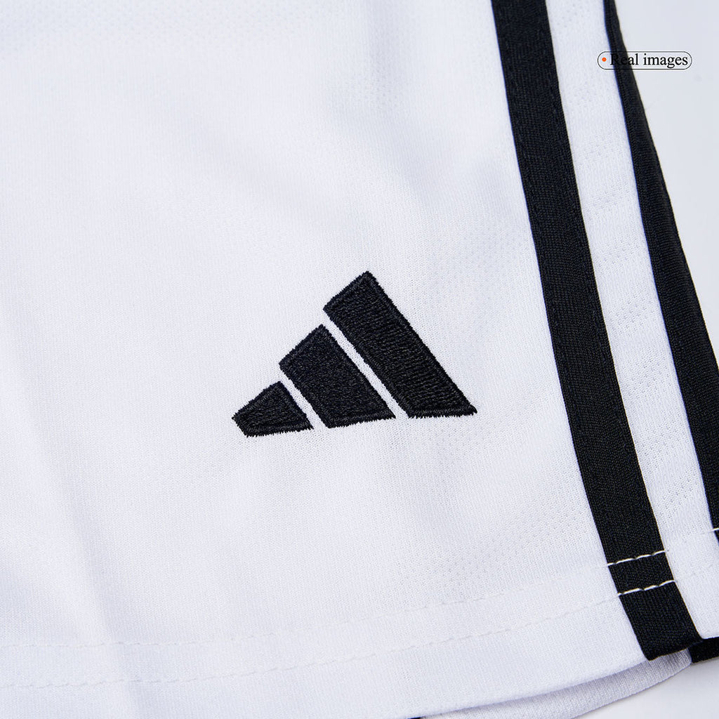 Kit de fútbol para niños: camiseta local del Manchester United (camiseta, pantalones cortos y calcetines) 2025/26