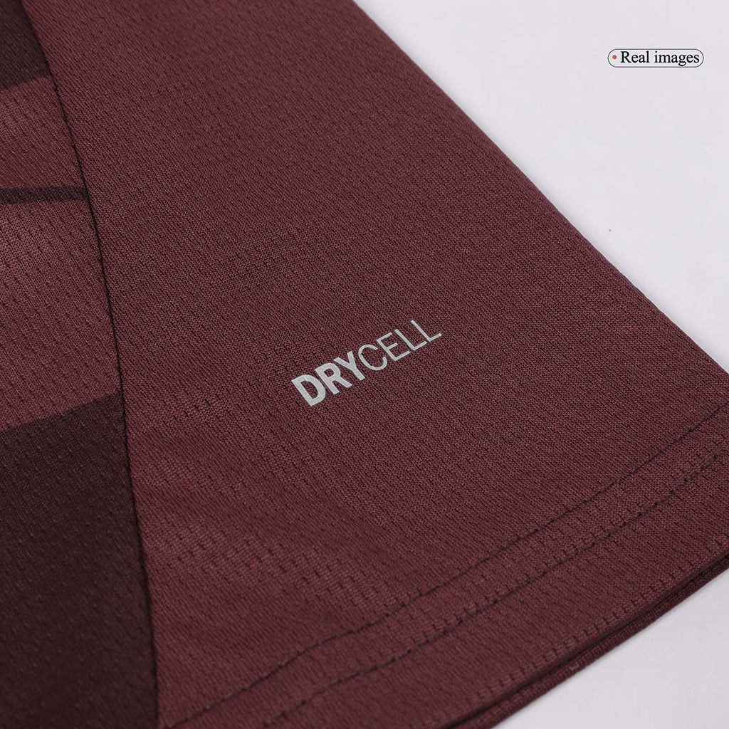 Camiseta de fútbol infantil de visitante del Manchester City (camiseta y pantalón corto) 2024/25